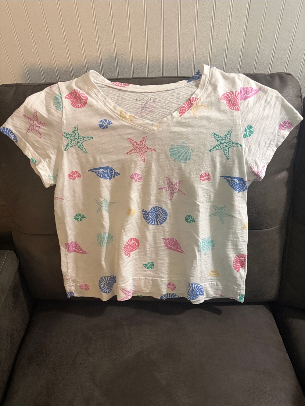 V-Neck White Short Sleeve Tee with Pastel Seashell Print